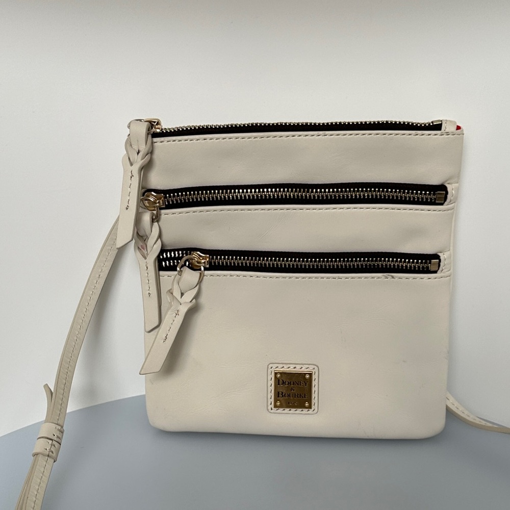 Dooney & Bourke White Crossbody Bag with Zipper Accents